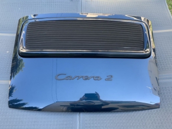 ฝากระโปรงท้ายแท้ Porsche 911 964 ฝากระโปรงเครื่อง ไม่มีรอยร้าวที่ปีก สัญลักษณ์ มีมอเตอร์ Extremely rare and valuable in excellent condition Porsche 911 964 genuine rear hood engine hood wing part unbroken emblem motor included rear wing, delivered by hand